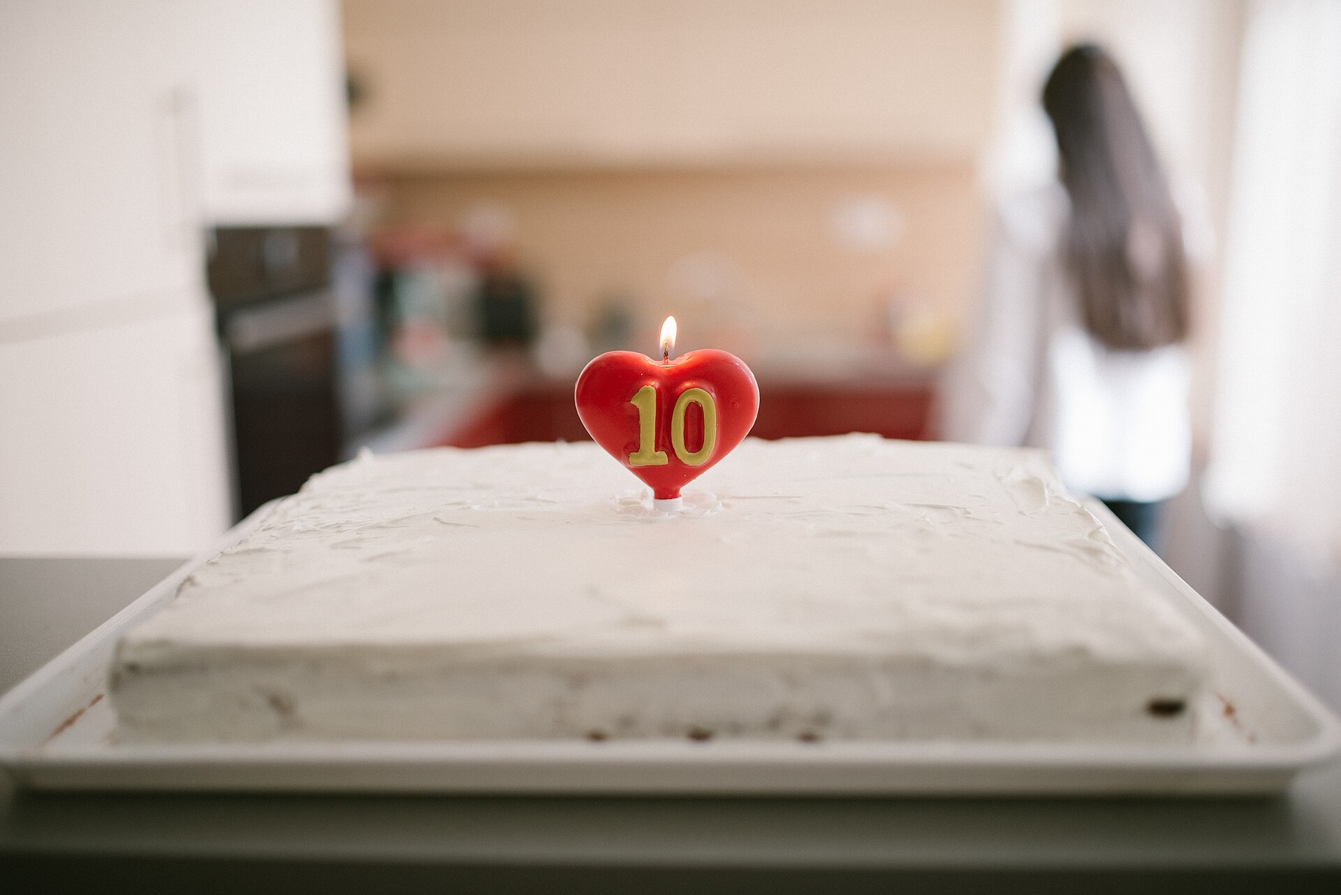 Heart-shaped cake with candles